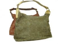 Jacquard Fabric Handbag with Gold (or Bronze) Embossed Print & PVC Single Handle. Top zipper closure.