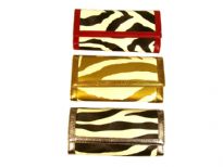 Designer Inspired Zebra Print check Book wallet. Wallet has a magnetic closure. Made of faux leather.