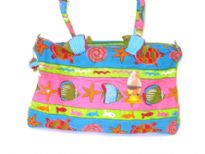100% cotton Beach Bag
Sea animals inspired beach bag made with double shoulder straps and a zipper closure.  Made of 100% Cotton. 