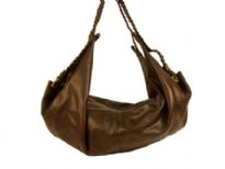 Designer Inspired Hobo Bag with a single strap and a zipper closure. Made of faux leather.