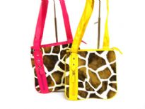 Designer Inspired Giraffe Print Crossbody Bag with zipper closure. Made of faux leather.