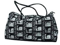 Betty Boop Film Duffel Bag with zipper. Made of fabric and double handle. 