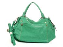 PVC Fashion Handbag.Top zipper closing. Front and Back zipper pockets. Center divider and shoulder strap.