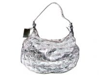 Metallic color Fashion Handbag.  Top zipper closing.