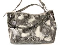 PVC Fashion Handbag has an animal print multi patch pattern, a top zipper closure, a double handle and a detachable shoulder strap.