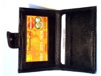 Carry your money in style. This is a bifold credit card and ID wallet. Made of genuine leather. As this is genuine leather, please be aware that there will be some small creases and nicks in the leather but the wallet are all brand new. 