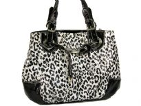 Leopard printed tote bag has a double handle, a top zipper closure and a drawstring detail. Made of PVC.