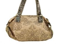 Designer Inspired Embroidered Shoulder Bag with zipper closure. Bag has a double handle with animal print pattern. Made of PU (polyurethane).