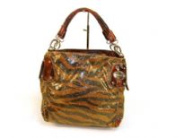 Designer Inspired Metallic Zebra Print Small Handbag with zipper closure and a double handle. Made of PU (polyurethane)