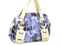 Printed PVC Fashion Handbag has an artwork pattern, a double handle, a top zipper closure and fashionable straps.