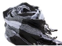 Checkered black & grey 100% polyester woven scarf which is crinkled as well as stretchable. Silver lining running through the scarf vertically. Twisted fringes on its ends. Hand wash. Imported.