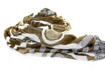 This artistically patterned 100% Polyester scarf in shades of olive is quilted and super soft to use. This retro scarf can be teamed with any kind of outfit. Thin fringes on the edges adds that extra zing to it. Imported.