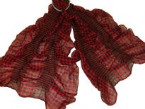 This checkered print red & black 100% polyester scarf can be a perfect accessory all year round. The scarf is stretched in the middle with striped pattern also & gives a ruffled look. Imported.