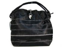 Fashion hobo bag a stripes pattern, a studded wing detail, a single strap and a zipper closure. Made of PVC.