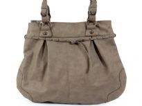 Fashion tote bag has a top zipper closure, a double handle and thin belt detail. Made of faux leather.
