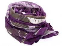 This Purple with Grey & Beige tones 100% polyester scarf has an abstract background with skulls print on it. Purple border all around & eyelash fringe along both its lengths. Imported. Hand wash. 