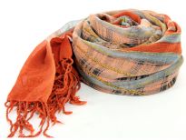 This Rust scarf has checkered print in the middle with tussels and Ropes running around it. The borders of the scarf are plain rust color with long fringes decorating the ends. 100% wool scarf. Imported. Hand wash.