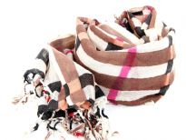 Long twisted fringe decorates the ends of a sumptuous wool scarf updated in an array of colors to match your every mood. Brown, fuchsia & black plaids over beige colored scarf. Imported. Dry clean only.