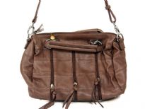 Fashion handbag with short double handle, detachable shoulder strap, top zipper closure, patchwork pattern and zipper details. Made of PU (polyurethane).