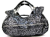 This handbag is made of polyurethane material. It has a cheetah animal print and a top zipper closure with double handle.
