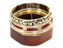 Earthy tones 5 piece fashion bangles set includes square wooden bangle with rounded corners, gold & brown 4 bangles each having its own etched design or is plain. Hand crafted beautifully designed costume jewelery set.