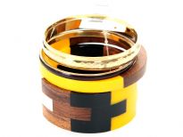 Artistically designed wide cuff bangle in resin & wood in 4 colors included in this 5 piece bangles set. Another yellow & wood colored resin bangle & 3 thin simple bangles in gold/black. This set can  give funky look to nay simple outfit. 