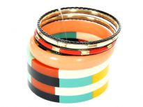Artistically designed colorful set can be matched with number of outfits any time of the day. 7 piece bangles set includes one wide cuff colorful bracelet, one peach rounded bangle, 3 thin black bangles & two ivory/gold resin bangles. 