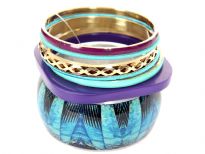 Beautiful & attractive seven piece bangles set has one painted wide cuff bangle, one purple square bangle, 2 turquoise fabric bangles, one gold etched design & 2 resin bangles. Can light up any outfit it is worn with. 