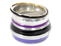 Purple & black striped silver wide cuff bangle in this four piece bangles set which also has silver wide bangle & 2 thin bangles in purple/black colors. Lightweight & durable costume jewelery set.