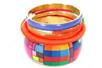 Geometic pattern 5 piece bangle bracelet set in bright colors. This is a hand painted artisan set. Imported.