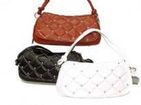 Designer Inspired Handbag has a checkered pattern with studded details. Bag also has a single strap. Made of faux leather.