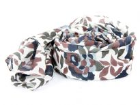 Ivory colored 100% cotton scarf with multicolored floral print on it. Imported. Hand wash.