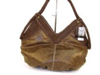 Designer Inspired Hobo Shoulder bag with a double handle and V-shapped zipper closure. Made of PU (polyurethane).