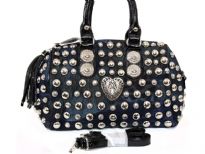 Studded all over denim fabric handbag. Top zipper closing double handle & adjustable shoulder straps included. Imported.
