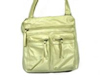 Fashion bag has multiple exterior pockets with zipper closure. Single strap. Made of PVC. 