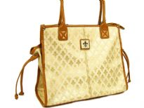Fleur De Liz Licensed Jacquard Handbag. This spacious bag in jacquard material has leather trim bordering the bag & also hanging tussles on the sides. Top zipper closure.
