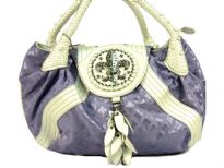 Fleur De Liz Licensed Jacquard Handbag with braided double handle & logo in rhinestones on the flap over the bag.