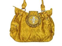 Fleur De Liz Licensed PVC Handbag. Logo print on the bag with two side zipper pockets. Top zipper closing with studded logo on the clasp over it.