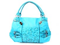 PVC double handle fashion handbag with cutout design in the front & belted embellishments also. Top zipper closing, outside zipper pocket & center divider inside the bag.