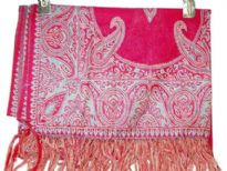 Fuchsia colored 100% Pure Wool Jamawar Shawl with paisley pattern in shades of green knitted into it. Fringes on the edges of the shawl. Imported.  