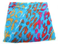 Semi-sheer turquoise blue polyester scarf with multi colored abstract print. Big size of the scarf makes it possible to be used as a shawl, wrap or scarf around the neck. Imported. Hand wash.