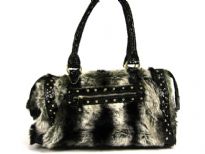 Faux Fur PU Fashion Handbag with Patent leather patchwork with studs over them. Double shoulder handle & zipper closure.