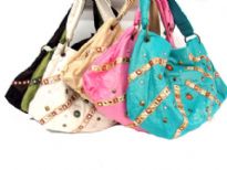 Stone Studded fabric handbag with single shoulder handle in same material