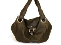 Soft PVC handbag with double shoulder handle & flap like closure on the top. 
