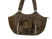 Designer Inspired Shoulder bag with vertical zipper details and leather like texture. Bag has a top zipper closure and a double handle. Made of PU (polyurethane).
