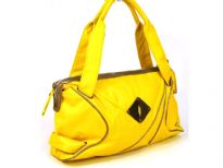Designer Inspired PU Handbag with broad double shoulder straps & artistic trim design in the front. Top zipper closure.