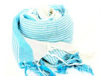 This bright turquoise colored viscose scarf with off-white combination can lighten up any mood or outfit. Loose threads like fringe at its edges. Imported.