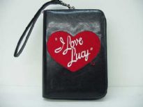I Love Lucy heart wallet has zipper made with PU (Polyurethane). 