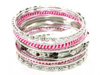 This 15 pieces set of fashion bangles includes one wide patterned bangle with deep red beads on it, 2 bangles have two-tone fabric on it, 2 have metal floral pattern on it & rest have glitter. 