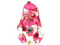 Betty Boop Licensed Printed PVC BackPack made of fabric. Has zipper closure and single adjustable strap. 